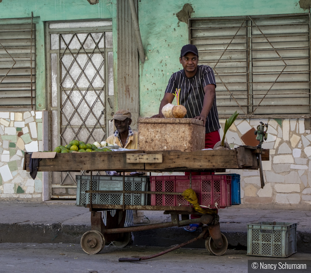 Cuban Juice Vendor by Nancy Schumann