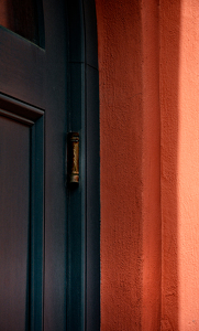 Blue Door Orange Border - Photo by Alene Galin